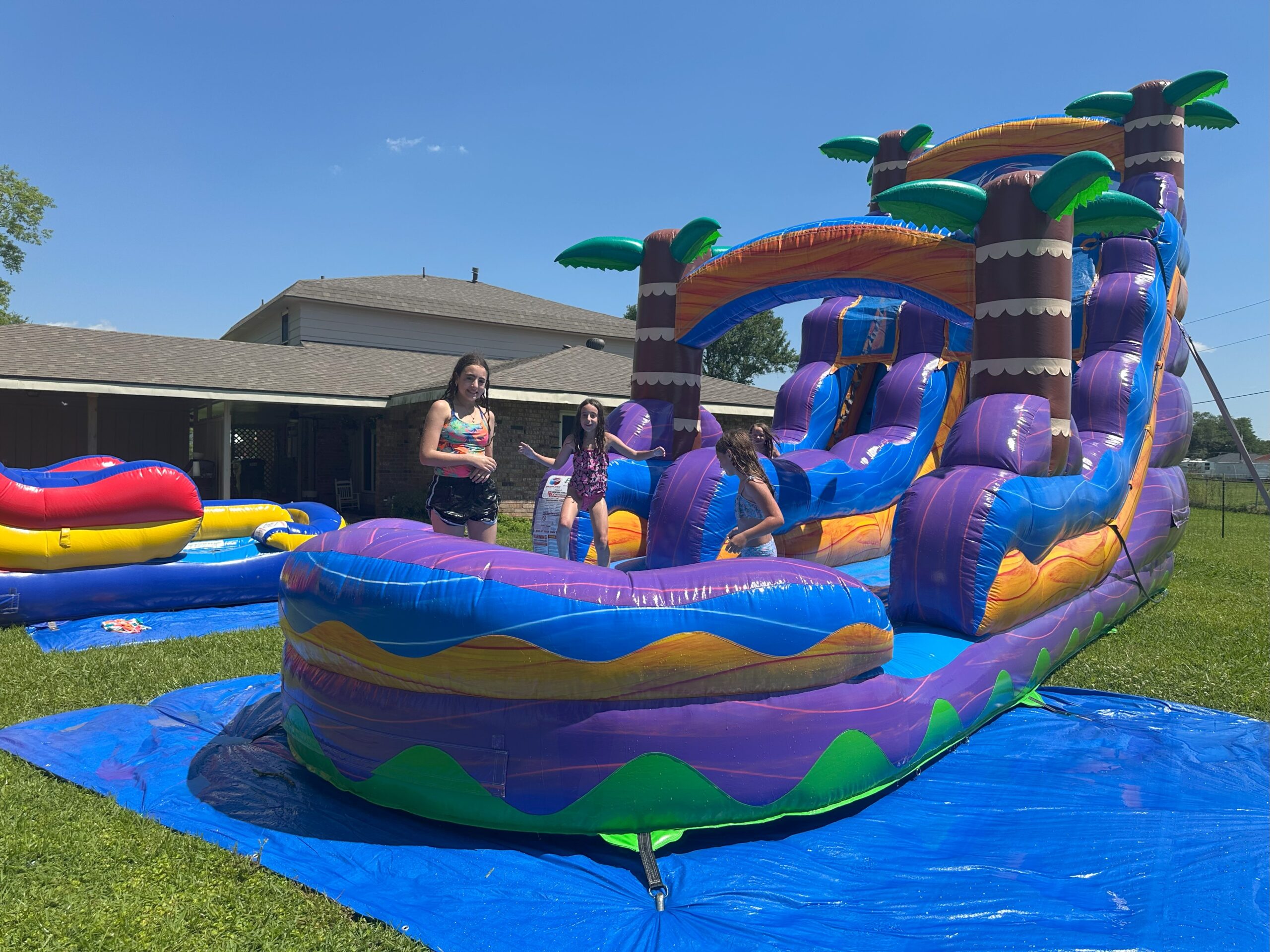 Waterslide rental setup for a family event in Houma Louisiana